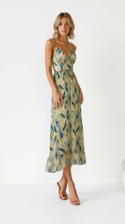 https://cdn.shopify.com/s/files/1/0806/5564/7050/files/muller-mode-hanne-armelloses-kleid-mit-blumendruck-fruhlingsmode-kleider-697952.jpg?v=1736675952